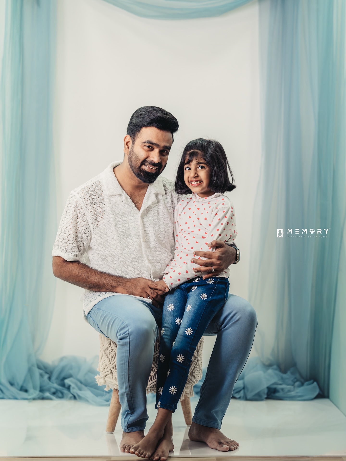 Father and daughter in the studio