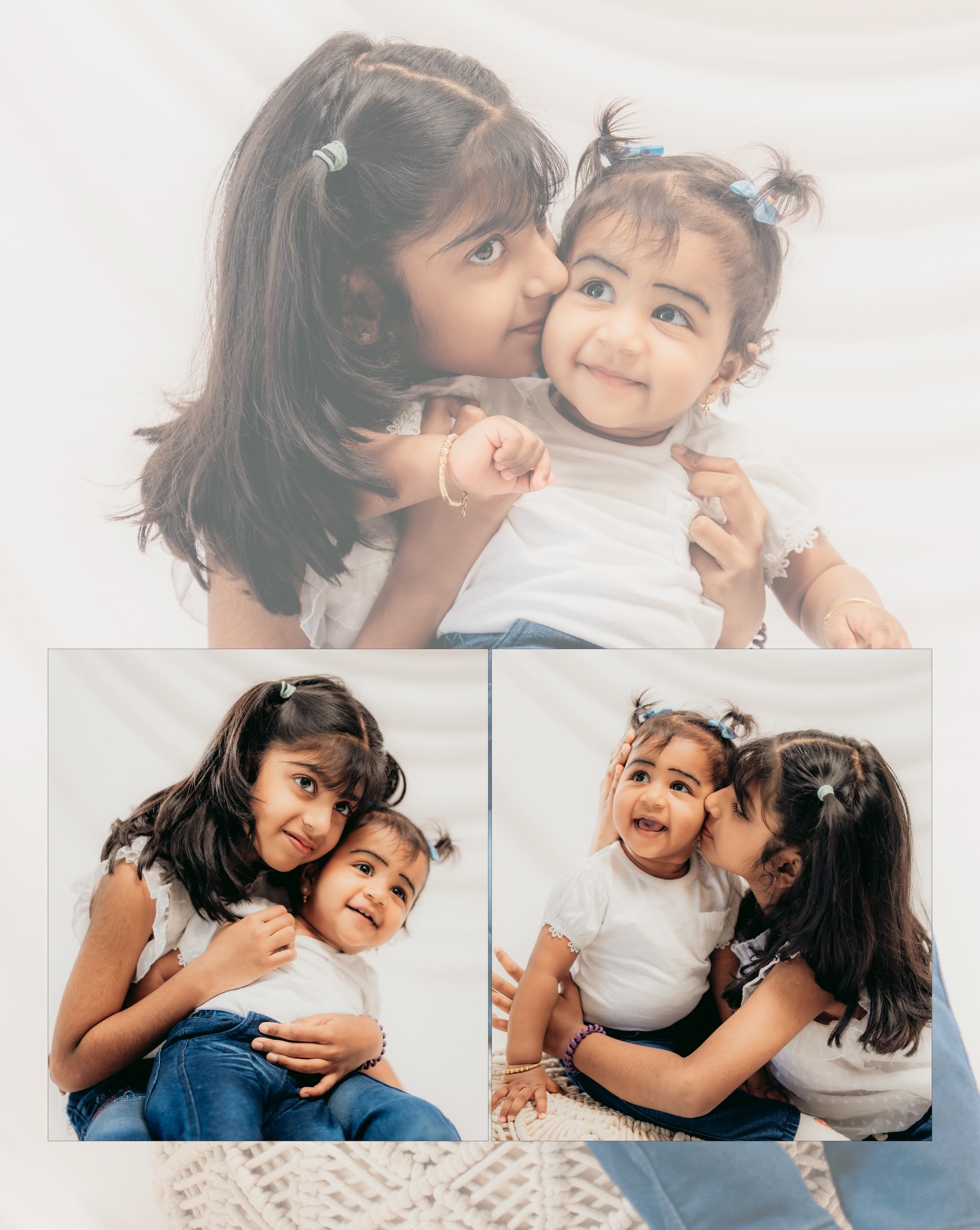 Big sister kissing her baby sister