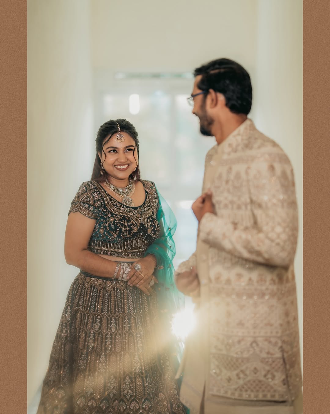 Bride and groom sharing a smile at the reception